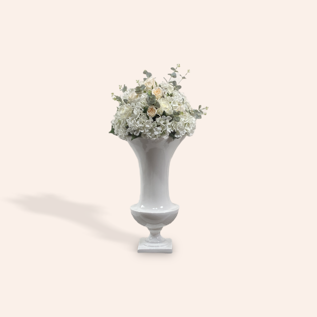 White Urn Pedestal with flowers